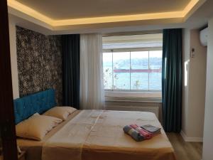 Istanbul Modern Flats with Amazing Sea View客房内的一张或多张床位