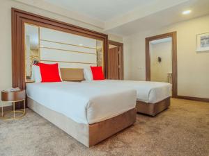 伊斯坦布尔博蒙蒂宜必思尚品酒店客房内的一张或多张床位