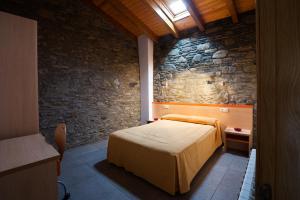 Allotjament Rural Cal Miquel客房内的一张或多张床位