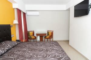 Hotel Gran Via - Centro客房内的一张或多张床位