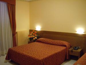 Hotel Zi Marianna客房内的一张或多张床位