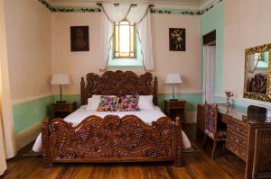 Florencio Casa Hacienda客房内的一张或多张床位