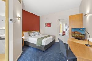 YEHS Hotel Melbourne CBD客房内的一张或多张床位