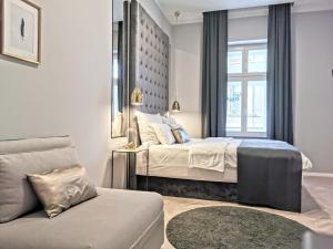 MINT Boutique Studio Apartments客房内的一张或多张床位