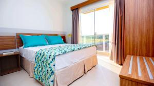 Ilhas do Lago Eco Resort客房内的一张或多张床位