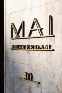 Hotel Mai Amsterdam的证书、奖牌、标识或其他文件