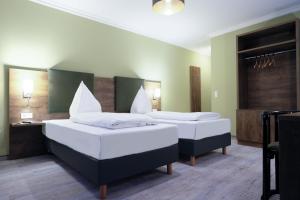 罗马德特酒店客房内的一张或多张床位