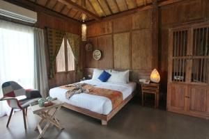 Amata Borobudur Resort客房内的一张或多张床位