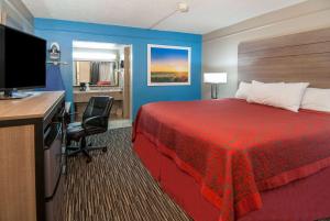 圣安东尼奥医学中心戴斯酒店客房内的一张或多张床位