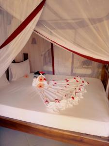 乌罗湾海滩度假酒店客房内的一张或多张床位