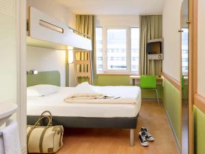 ibis budget Aachen City客房内的一张或多张床位