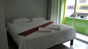 七岩海星旅馆客房内的一张或多张床位