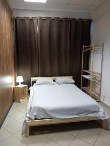 Melaya Budget Hostel客房内的一张或多张床位