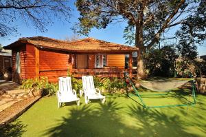 Sede Eli‘ezerאיתן בקתות עץ Eitan Wood Cabins Resort的相册照片