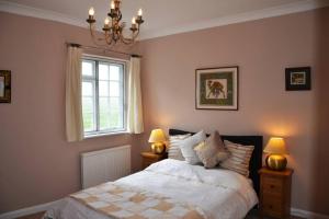 NEW - Beautiful, spacious Beechwood Lodge with lovely gardens客房内的一张或多张床位