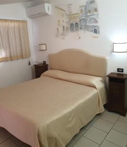 Hotel Ristorante Bagnaia客房内的一张或多张床位