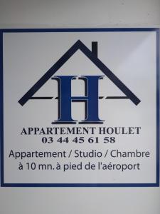 Tillé豪勒特公寓的屋顶公寓的标志