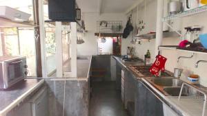 Casa Al alba jardín的厨房或小厨房