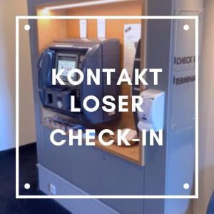 慕尼黑慕尼黑MLOFT公寓式酒店的带有现金登记册的Kronitz激光检查标志