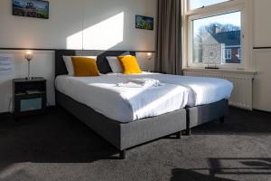 Stad & Strandhotel Elisabeth客房内的一张或多张床位