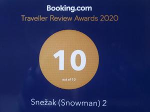 博希尼Snežak (Snowman) 2的金圆旅行评审奖的标志