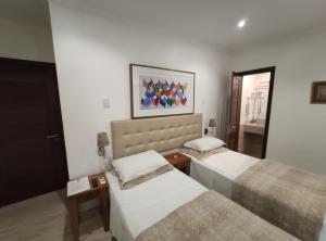 Pousada Bahia Pelô客房内的一张或多张床位