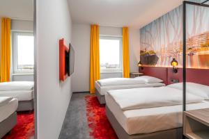 Campanile Duisburg City客房内的一张或多张床位