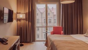 克拉利奥奥丁连锁酒店客房内的一张或多张床位