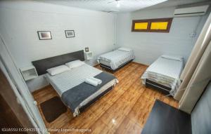 Iguassu Eco Hostel - IguassuEcoHostel - Eco Suítes客房内的一张或多张床位