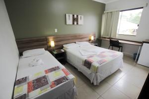 Beira Lago Palace Hotel客房内的一张或多张床位