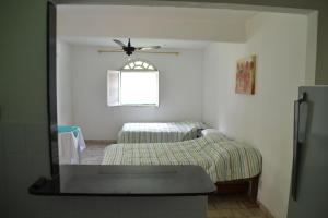 伊塔奥卡营地旅馆客房内的一张或多张床位