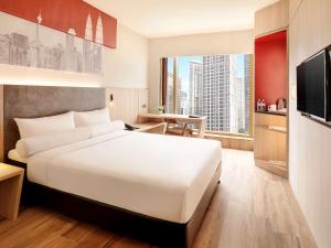 宜必思吉隆坡市中心酒店 客房内的一张或多张床位