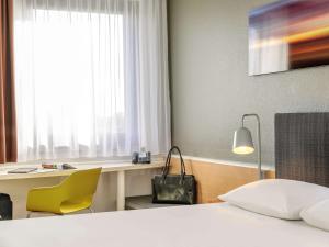 布莱梅中心宜必思酒店客房内的一张或多张床位