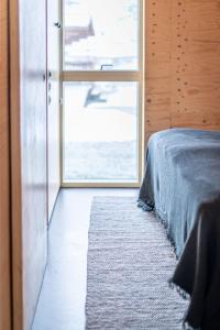 Aska, Modern Cabin客房内的一张或多张床位