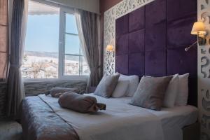 梅尔罗斯棉花堡美景套房酒店客房内的一张或多张床位