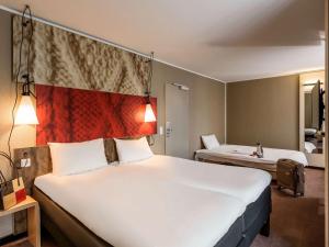 
慕尼黑宜必思酒店客房内的一张或多张床位

