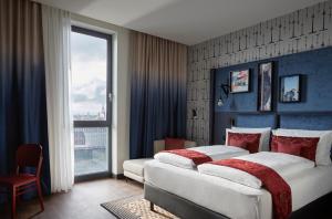 Hotel Indigo Berlin - East Side Gallery客房内的一张或多张床位