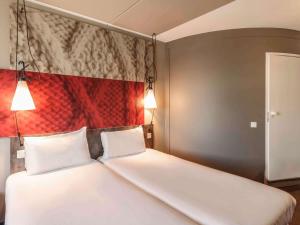 阿姆斯特丹市西宜必思酒店客房内的一张或多张床位