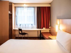 克拉科夫中心宜必思酒店客房内的一张或多张床位