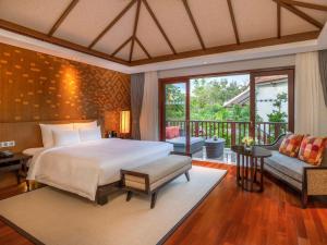 琅勃拉邦铂尔曼酒店客房内的一张或多张床位