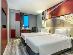 曼谷冲击宜必思酒店 客房内的一张或多张床位