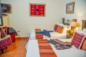 Hotel Meson del Valle by AHS客房内的一张或多张床位
