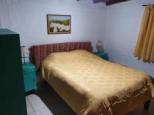 Exelente Casa en Potrerillos客房内的一张或多张床位
