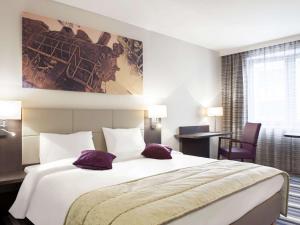 布鲁塞尔中心米迪美居酒店客房内的一张或多张床位