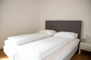 Appartements Freiraum客房内的一张或多张床位