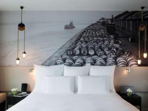 利物浦普尔曼酒店客房内的一张或多张床位