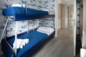 皇后公寓式酒店客房内的一张或多张双层床