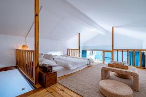 大理山海一隅海景酒店客房内的一张或多张床位