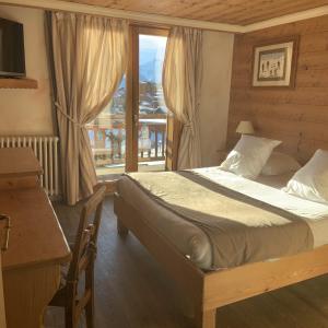阿祖尔阿尔卑斯酒店客房内的一张或多张床位