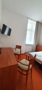 Hostel Ratuszowy客房内的一张或多张床位